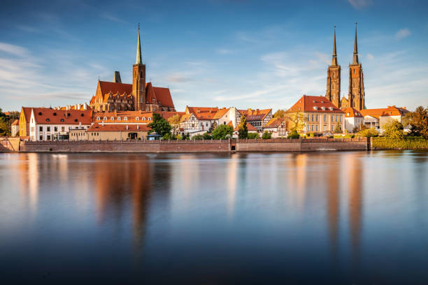 Poland, Wroclaw cityscape. Wroclaw historic old town by Odra river. The Cathedral of St. John the Baptist at the sunset. Famous polish landmarks.